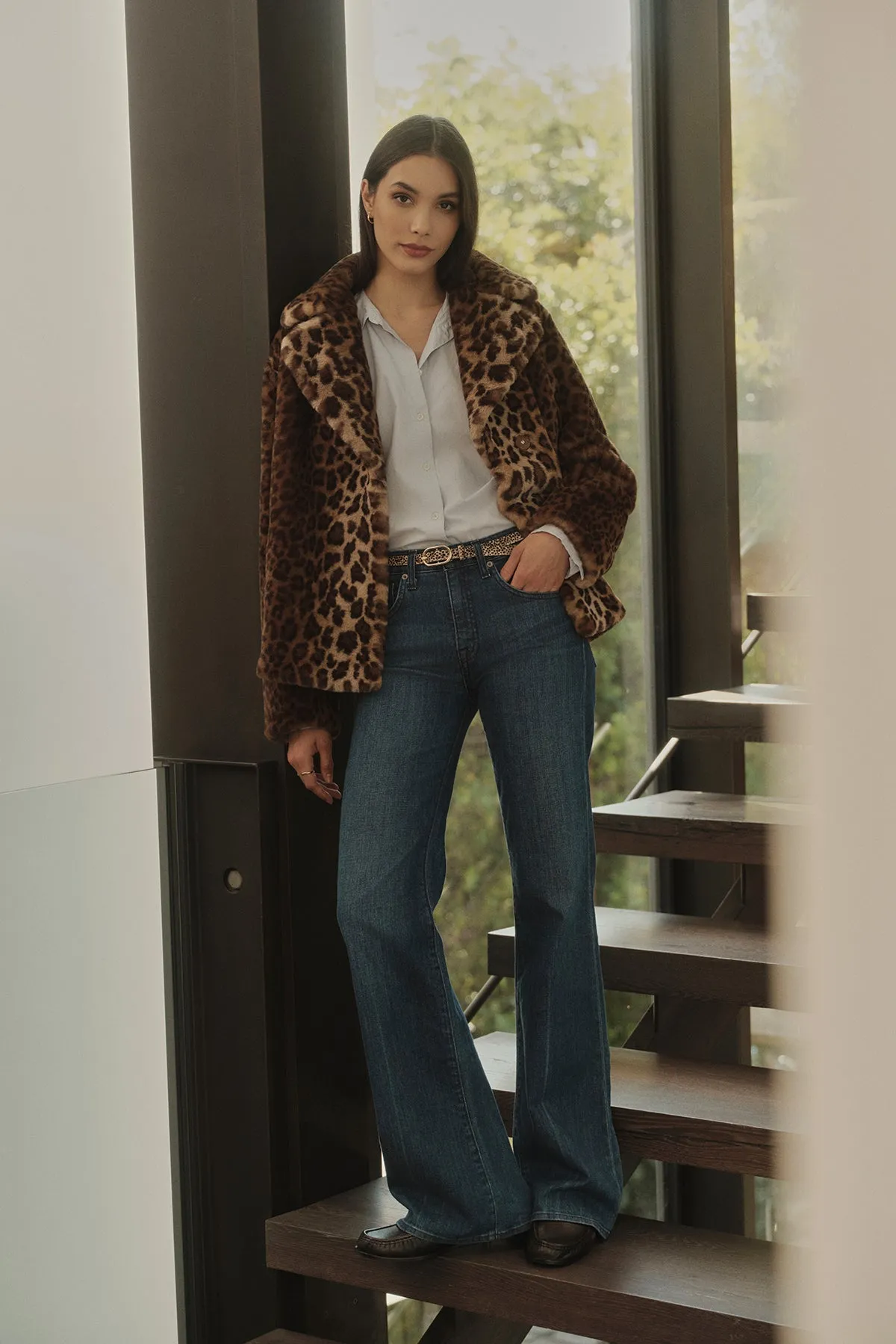 Heres an optimized title for your e-commerce product with added modifiers:

Chic Amani Leopard Print Luxurious Faux Fur Jacket for Women

This title uses descriptive language to attract potential buyers and emphasizes the key features of the product (chic, leopard print, luxurious, faux fur), including the target audience (women).